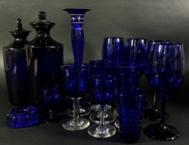 A collection of Bristol Blue Glassware, including four wine glasses, eight medium size wine glasses,
