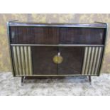 A mid-20th century floorstanding radiogram, Arkansas Deluxe with Garrard sliding turntable and
