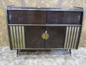 A mid-20th century floorstanding radiogram, Arkansas Deluxe with Garrard sliding turntable and