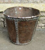 A large rivetted copper tub, 46 cm high x 54 cm diameter (folded rim misshapen af)