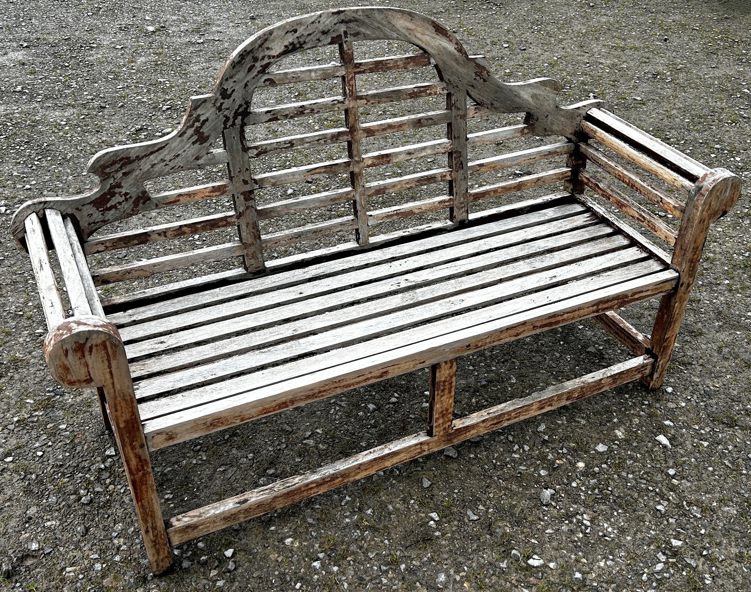 A weathered stained Lutyens style three seat garden bench 166 cm long