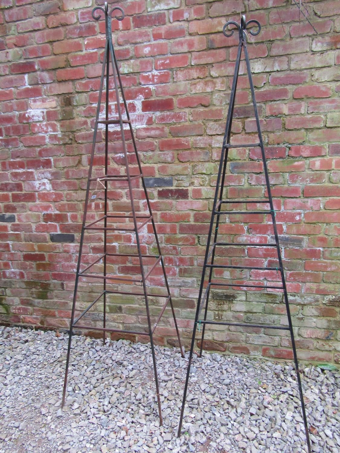 A weathered tall pyramid shaped steel garden obelisk with open scroll finial approx 240 cm high - Image 3 of 3