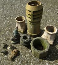 A reclaimed weathered cylindrical buff coloured chimney pot with louvre top, 76 cm high together