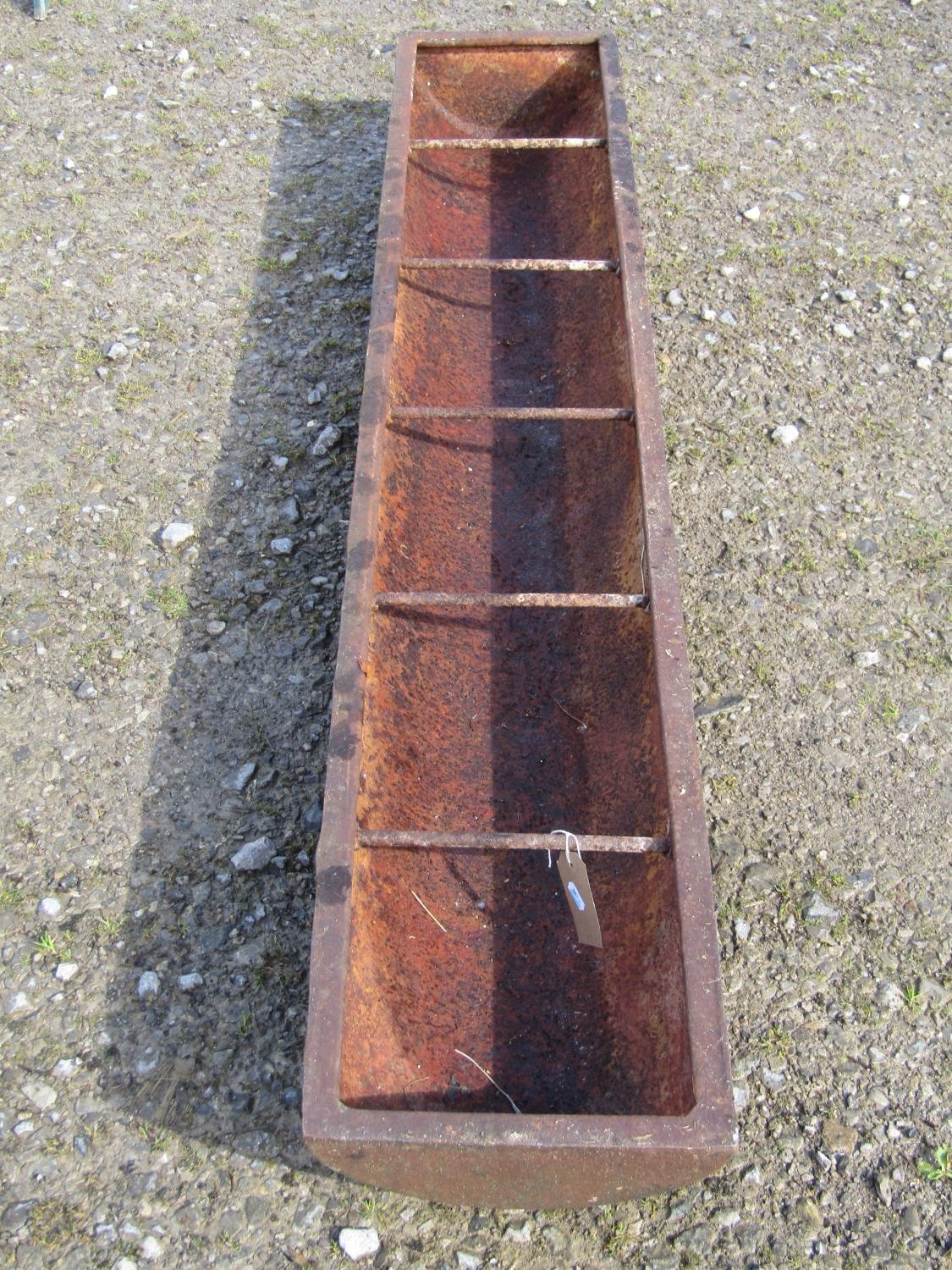 An old cast iron rectangular pig trough with five simple rung divisions, 181cm long x 32cm wide x - Image 2 of 3