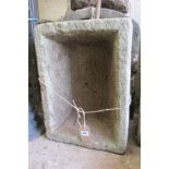 A weathered rectangular natural stone trough, 21cm high x 54cm x 39cm