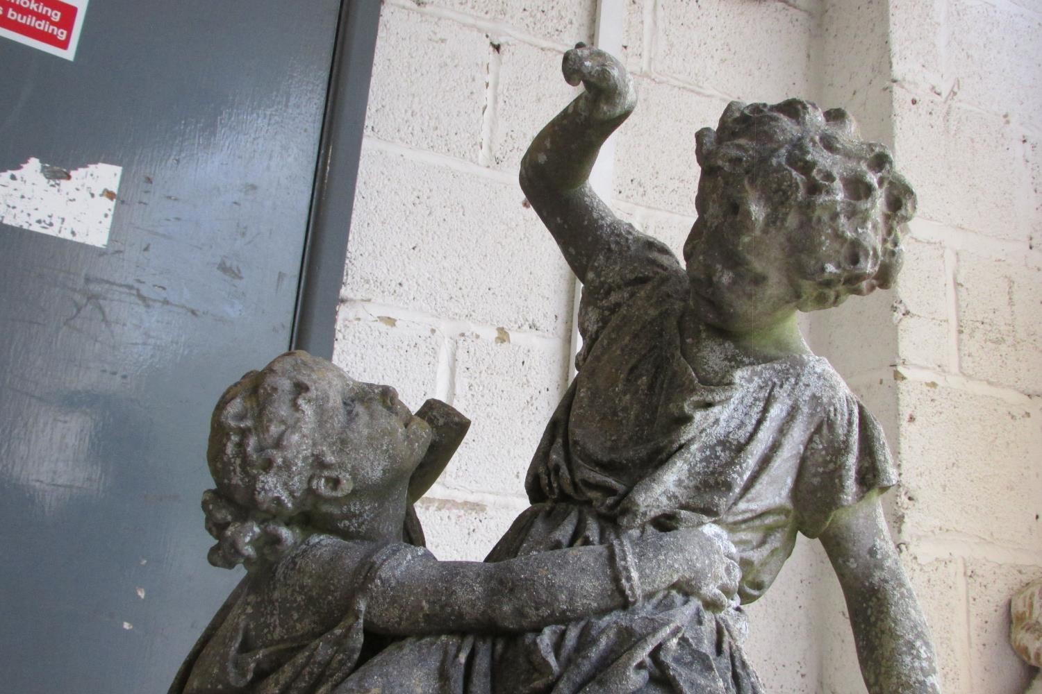 A 19th century weathered marble garden figure group, in the form of jostling infants on a - Image 6 of 7