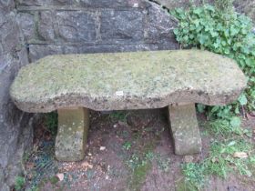 A good weathered cast composition stone crescent shaped bench, 113cm wide x 38cm deep x 46cm high