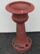 A large moulded terracotta planter jardiniere / planter on stand, the urn with flared egg and dart