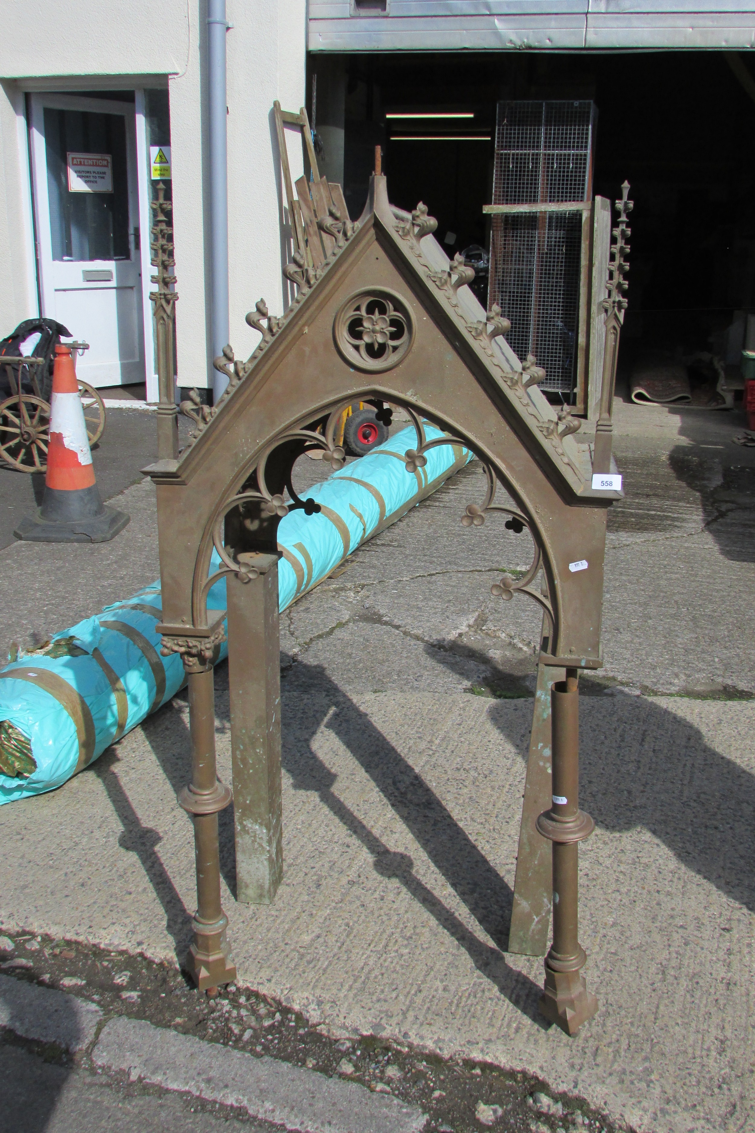 A large 19th century ecclesiastical brass tabernacle canopy, with gothic spire finials and pierced