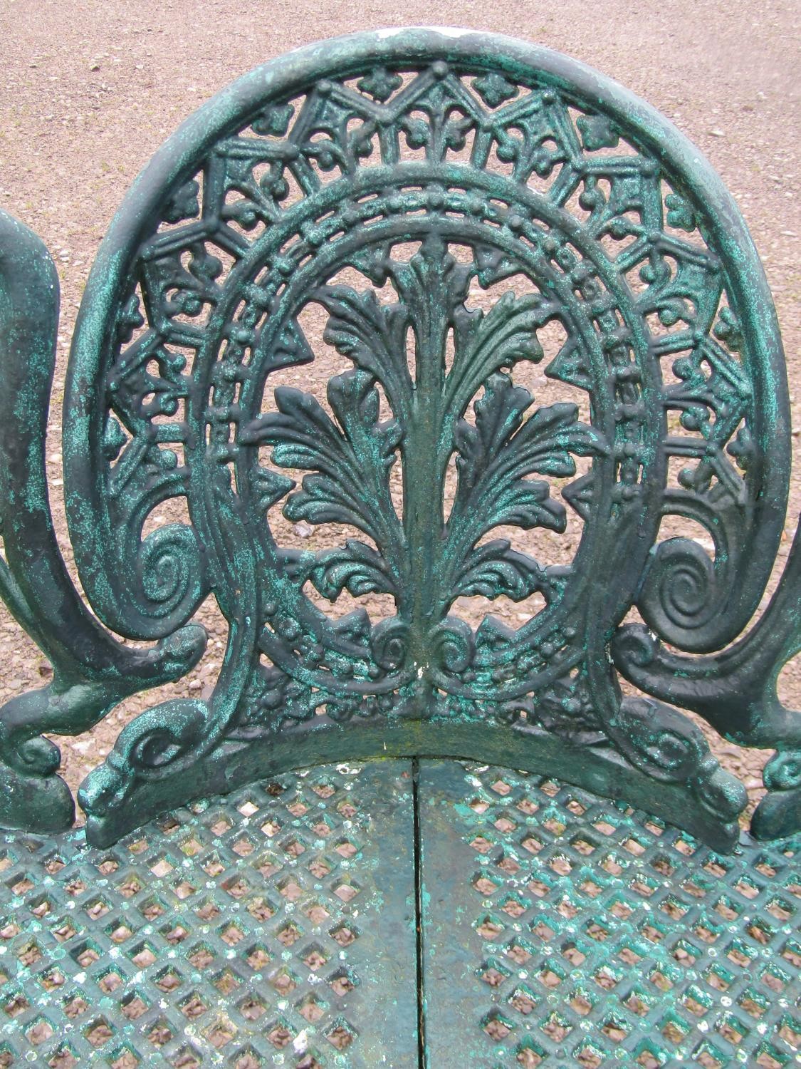 A weathered green painted cast alloy garden bench with shaped outline and decorative pierced - Image 3 of 10