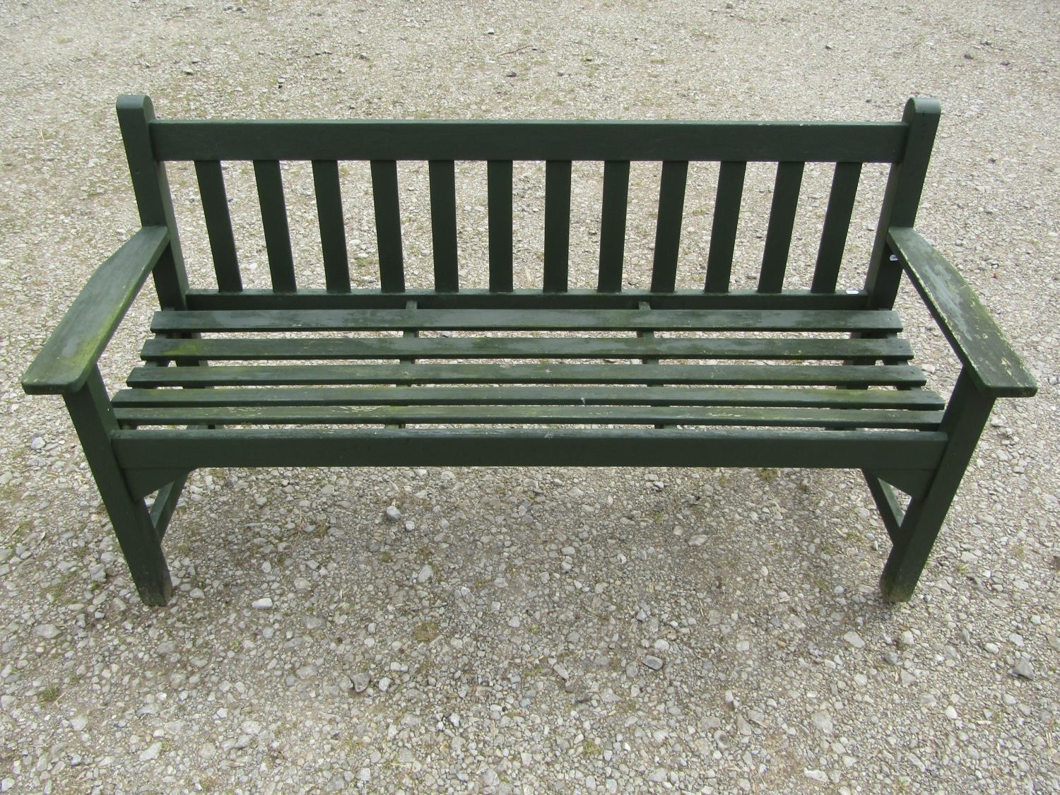 A vintage green painted teak three seat garden bench with slatted seat and back (probably a Lister