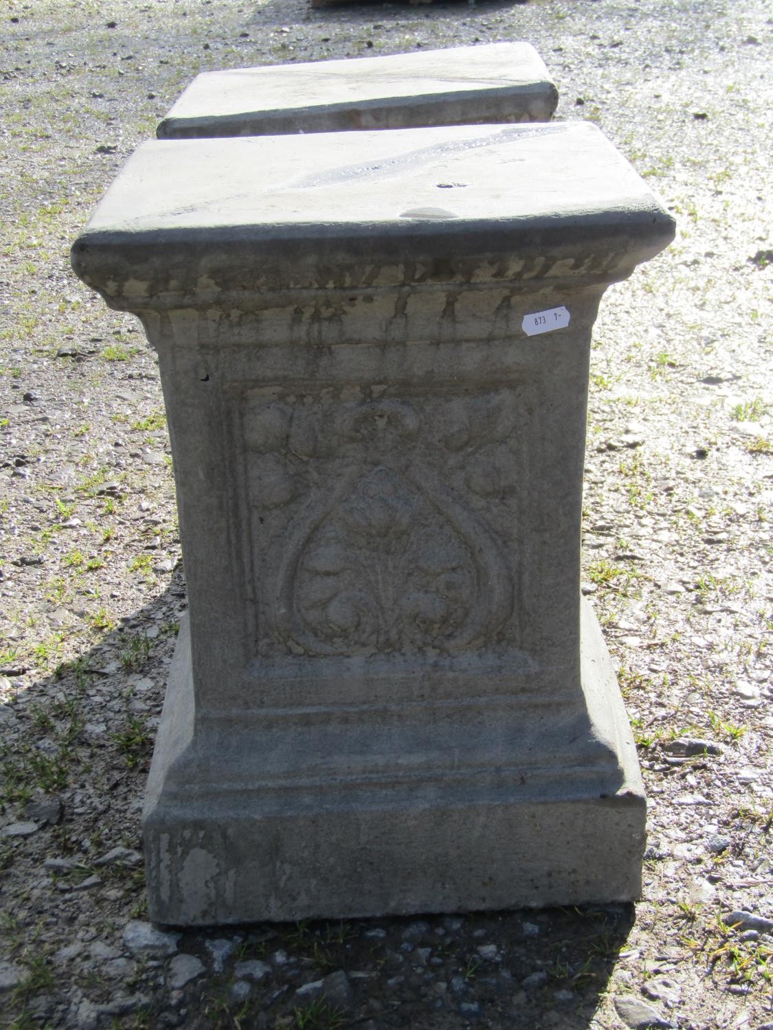 A pair of cast composition stone square cut and stepped pedestals, with repeating foliate panels, - Image 2 of 3