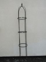 A painted steel strap work garden obelisk of cylindrical and domed form with spear head finial, 37