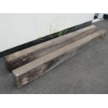 A pair of weathered oak beams with simple chamfered detail, 22 cm high x 239 cm long x 13 cm deep