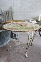 A weathered rustic painted metalwork patio / garden table, with tubular framework, 70cm high, 95cm