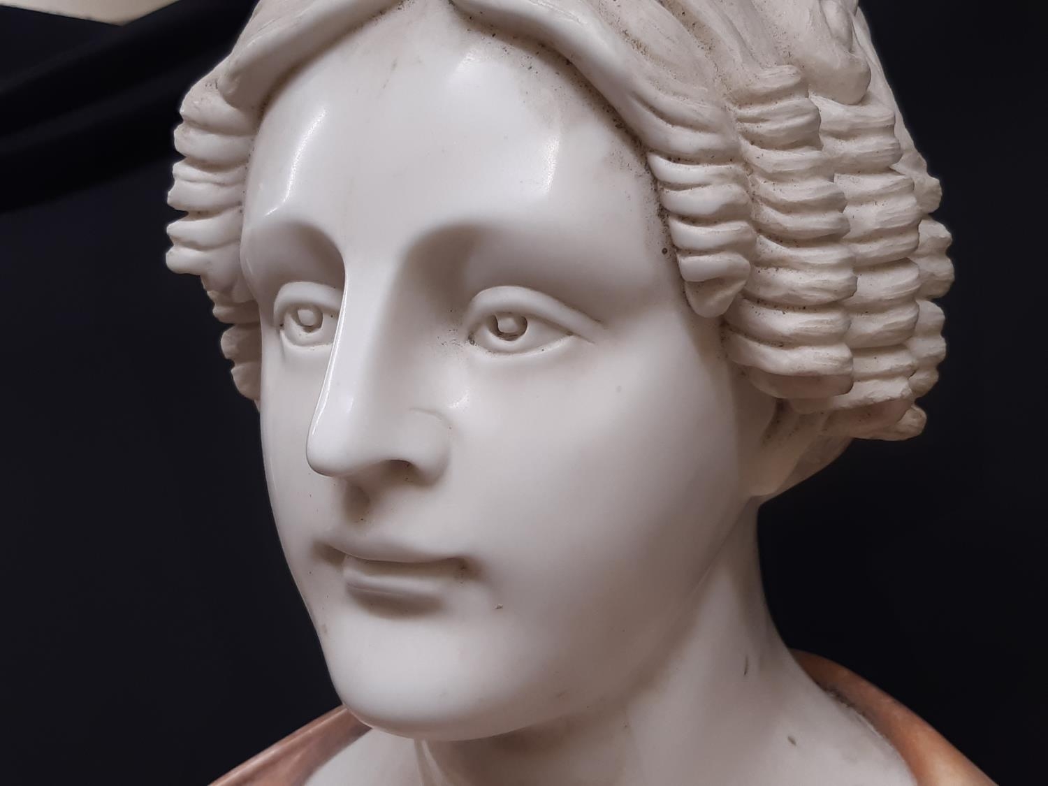 A carved marble bust of a Victorian maiden, her hair in ringlets, principally in Carrara marble, - Image 4 of 10