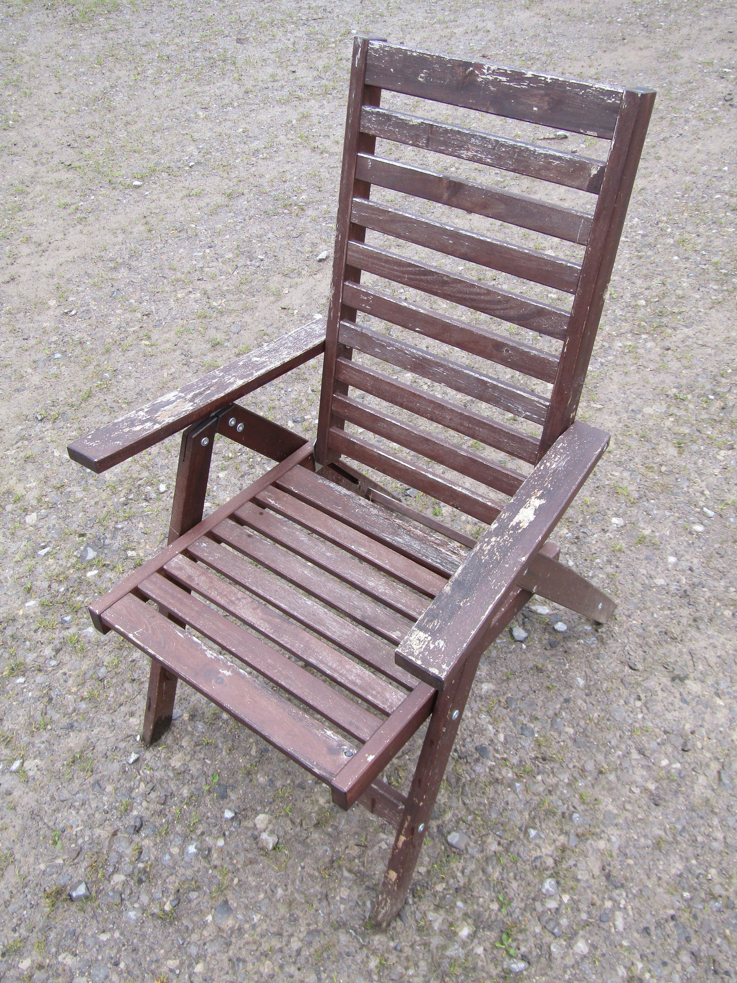 A set of four stained and weathered contemporary folding hardwood garden armchairs with slatted - Image 3 of 4