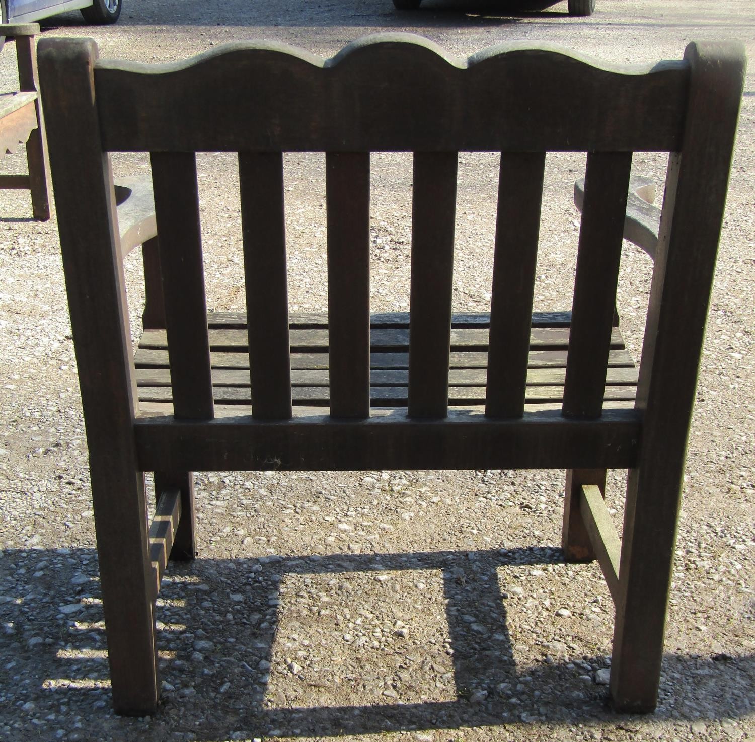 A Bridgman & Co Ltd stained and weathered teak three seat garden bench 161 cm wide and a pair of - Image 4 of 11