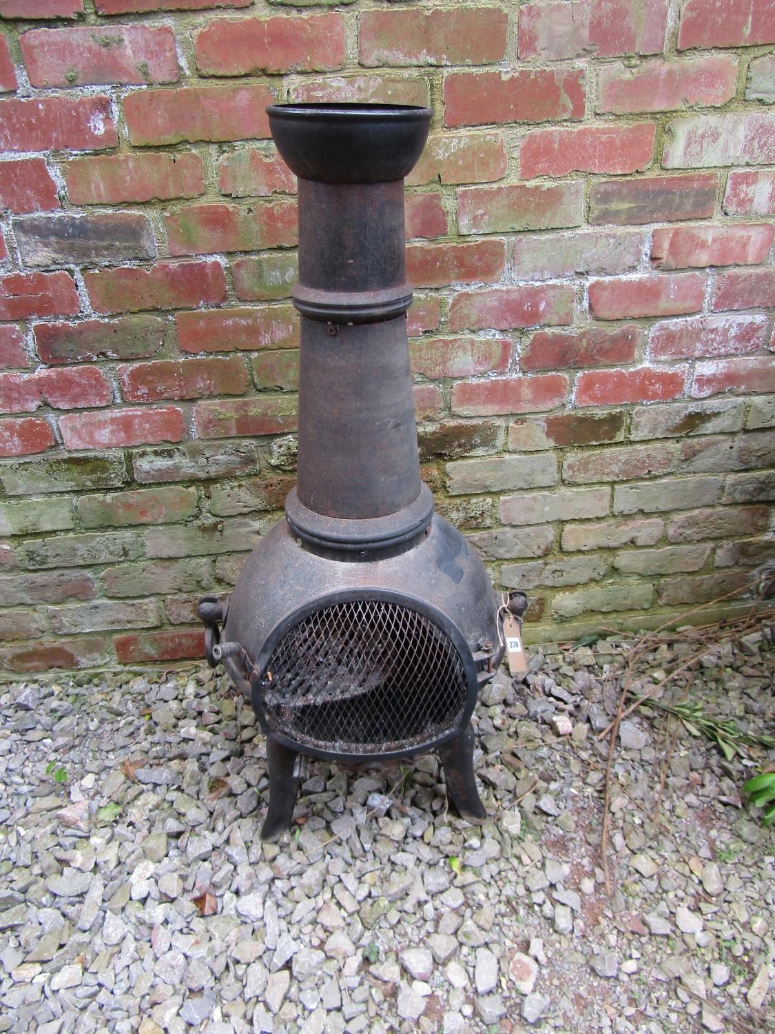 A cast iron chimenea and cover, 110 cm high - Bild 2 aus 3