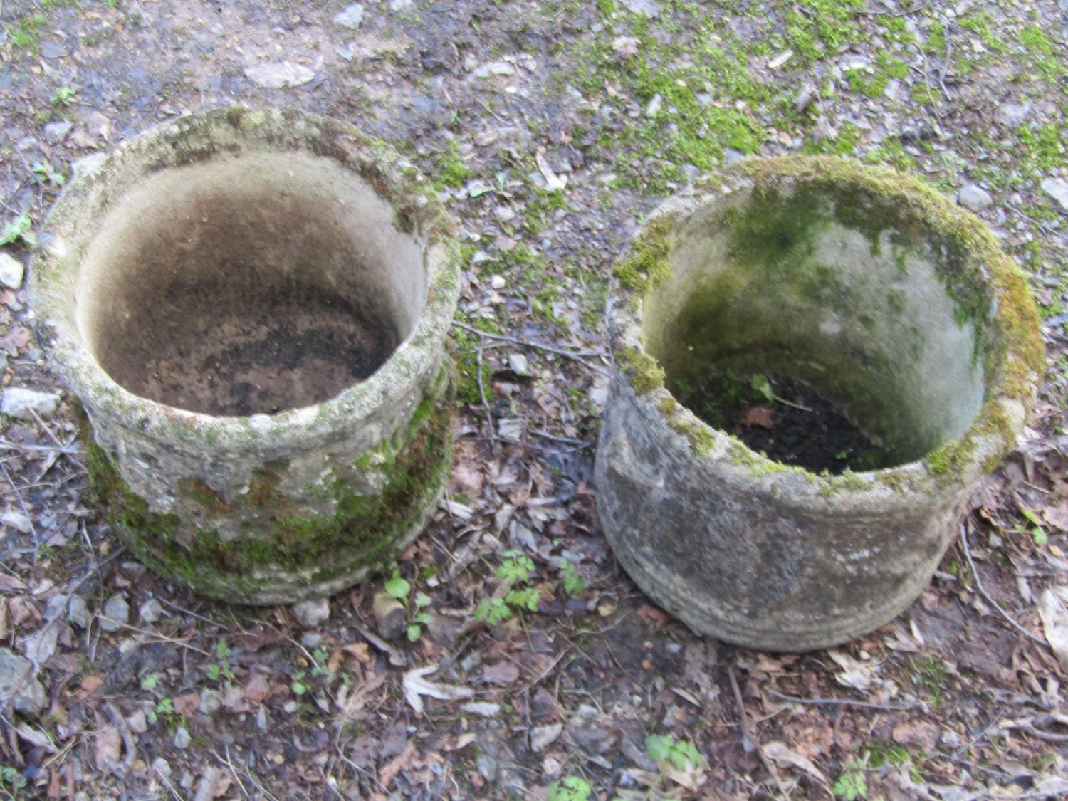 A pair of weathered cast composition stone squat cylindrical planters with repeating classical - Image 3 of 5