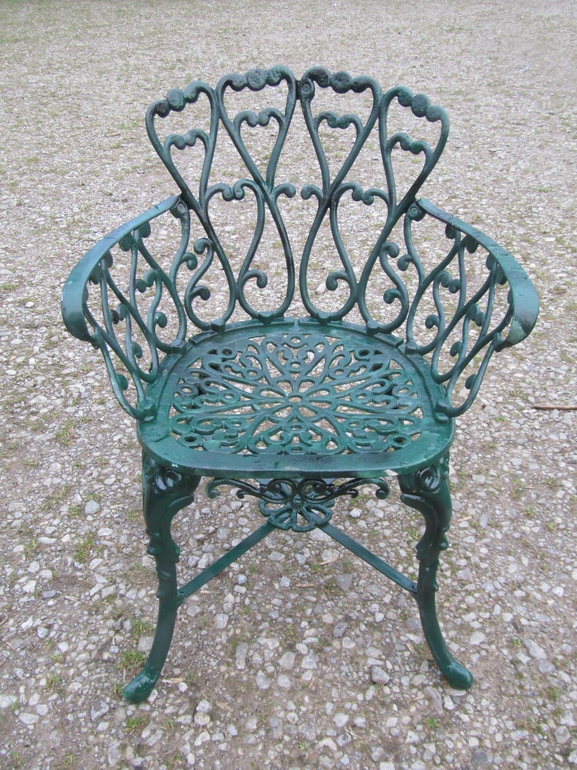 A green painted cast alloy circular two tier garden terrace table, with decorative repeating 'c' - Image 3 of 7