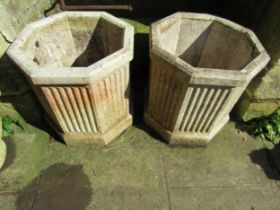 A pair of good quality weathered cast composition stone octagonal fluted planters, 52cm high x