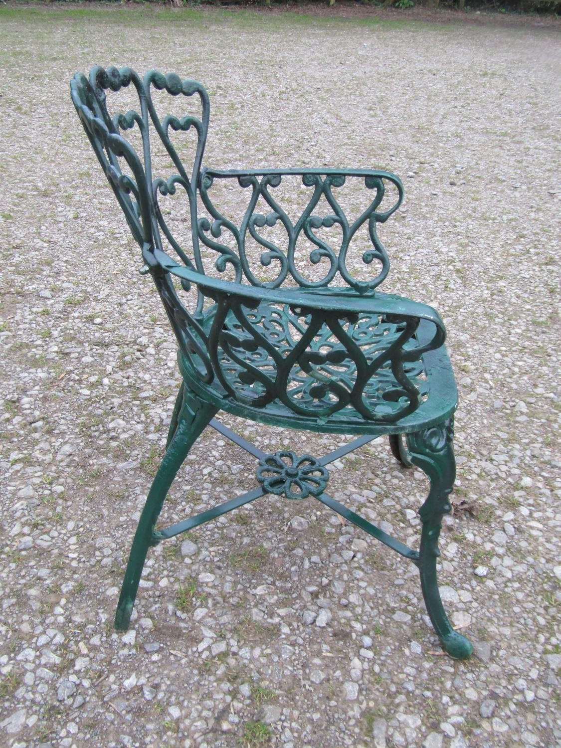 A green painted cast alloy circular two tier garden terrace table, with decorative repeating 'c' - Image 4 of 7