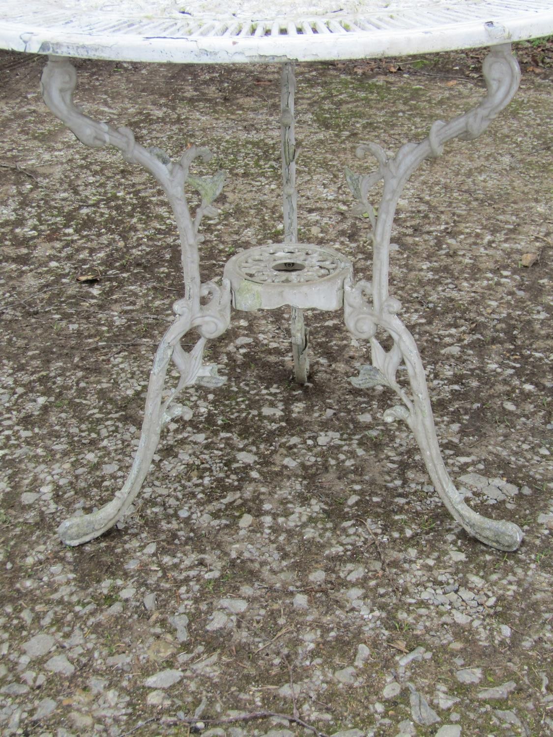 A weathered cream painted cast aluminium garden terrace table with decorative pierced circular top - Image 3 of 4