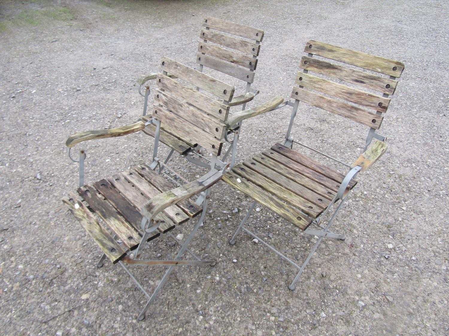 A set of three folding steel framed garden open armchairs with weathered timbered slats, 63 cm - Image 2 of 5