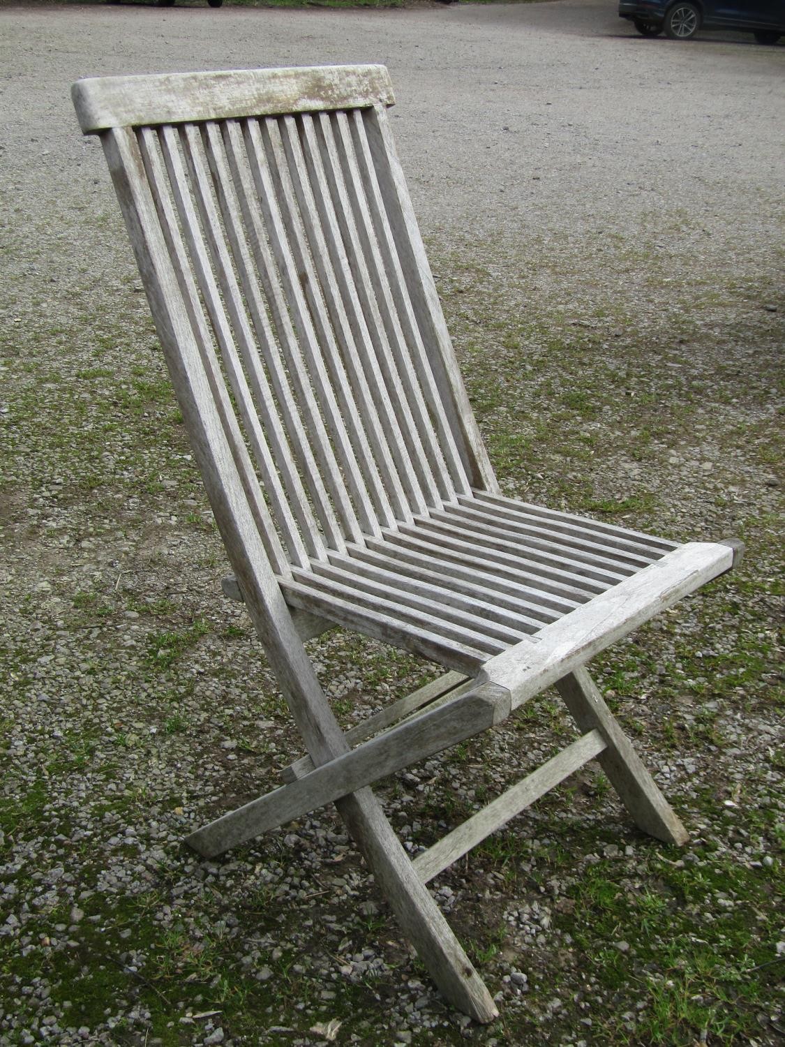 A Bramblecrest weathered teak folding garden table with rectangular slatted panelled top raised on x - Image 5 of 8