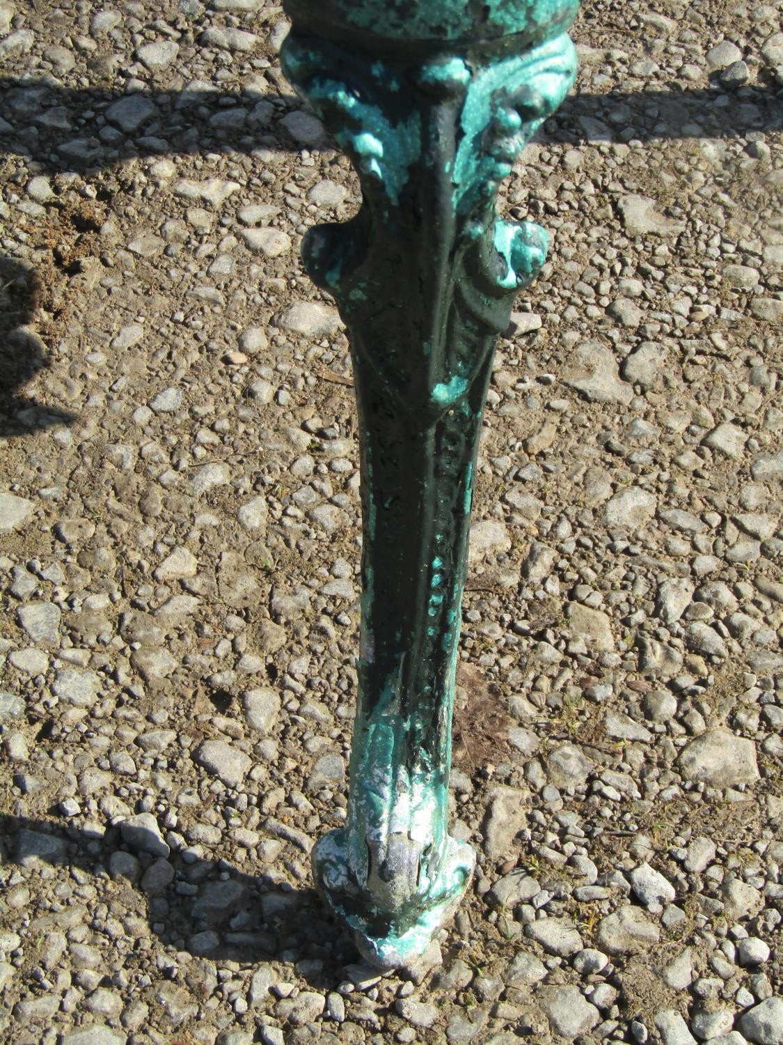A weathered green painted cast alloy garden bench with shaped outline and decorative pierced - Image 10 of 10