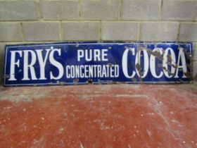 An old rectangular enamel sign advertising Fry's Pure Concentrated Cocoa 51 cm x 230 cm
