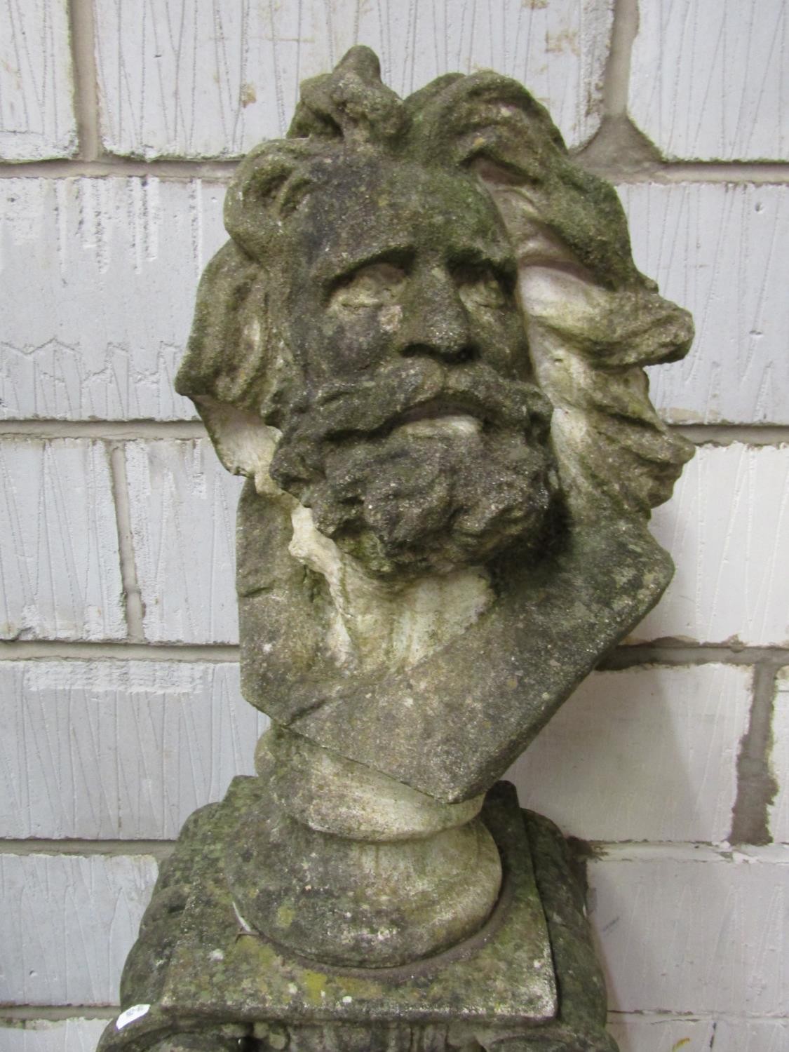 A weathered cast composition stone bust of a male character with flowing hair and beard raised on - Image 3 of 4