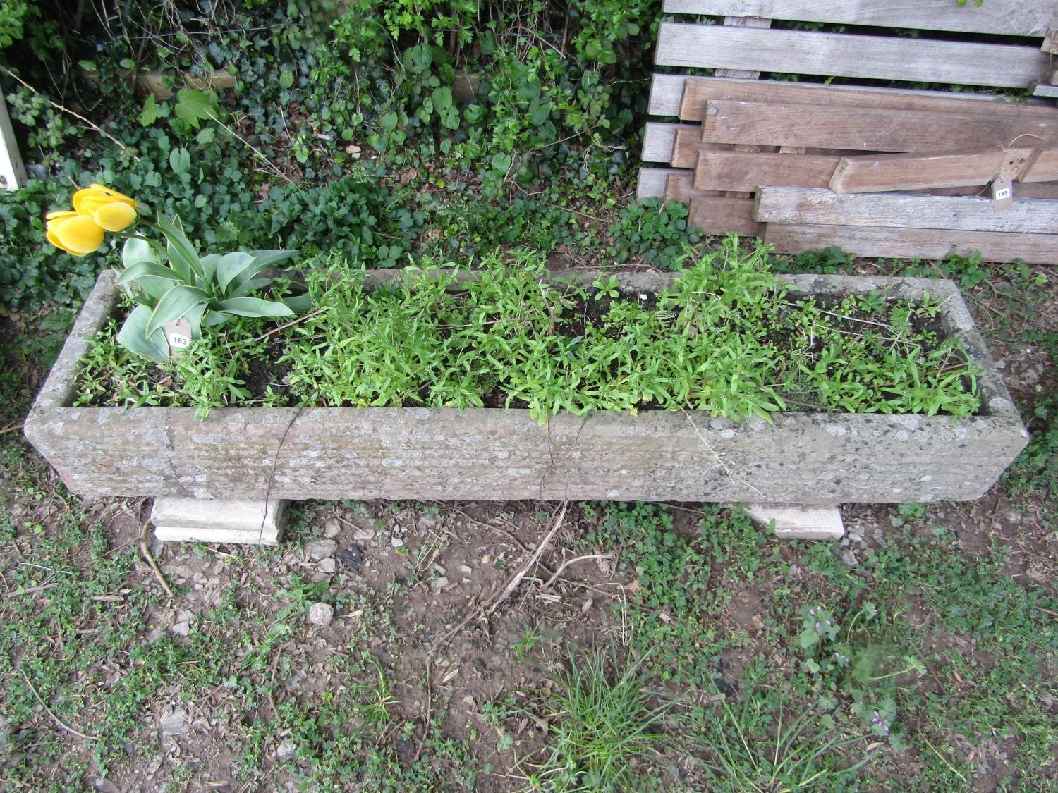 A carved rectangular weathered natural stone sink/trough, 20 cm high x 77 cm x 61 cm