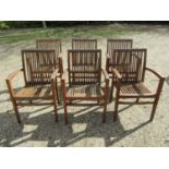 A set of six Nauteak good quality weathered stained teak garden open arm chairs with slender slatted