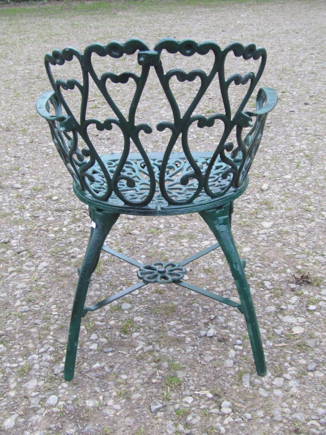 A green painted cast alloy circular two tier garden terrace table, with decorative repeating 'c' - Image 5 of 7