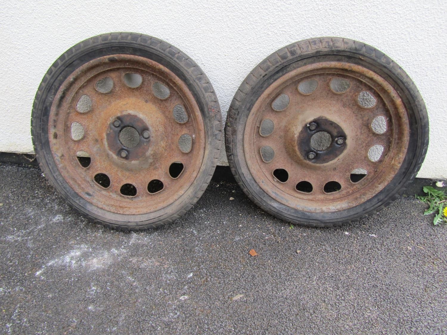 An old pair of artillery wheels