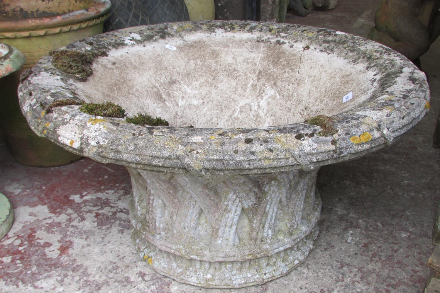 A large and impressive 19th century weathered carved natural stone planter / urn of flared form with - Image 5 of 8