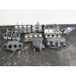 A collection of assorted motorcycle carburettors