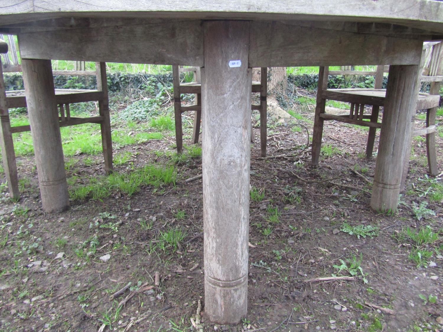 A good quality large weathered (silvered teak) circular garden table with slatted panelled top and - Image 5 of 6