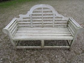 A weathered teakwood Lutyens style three seat garden bench, 167cm wide