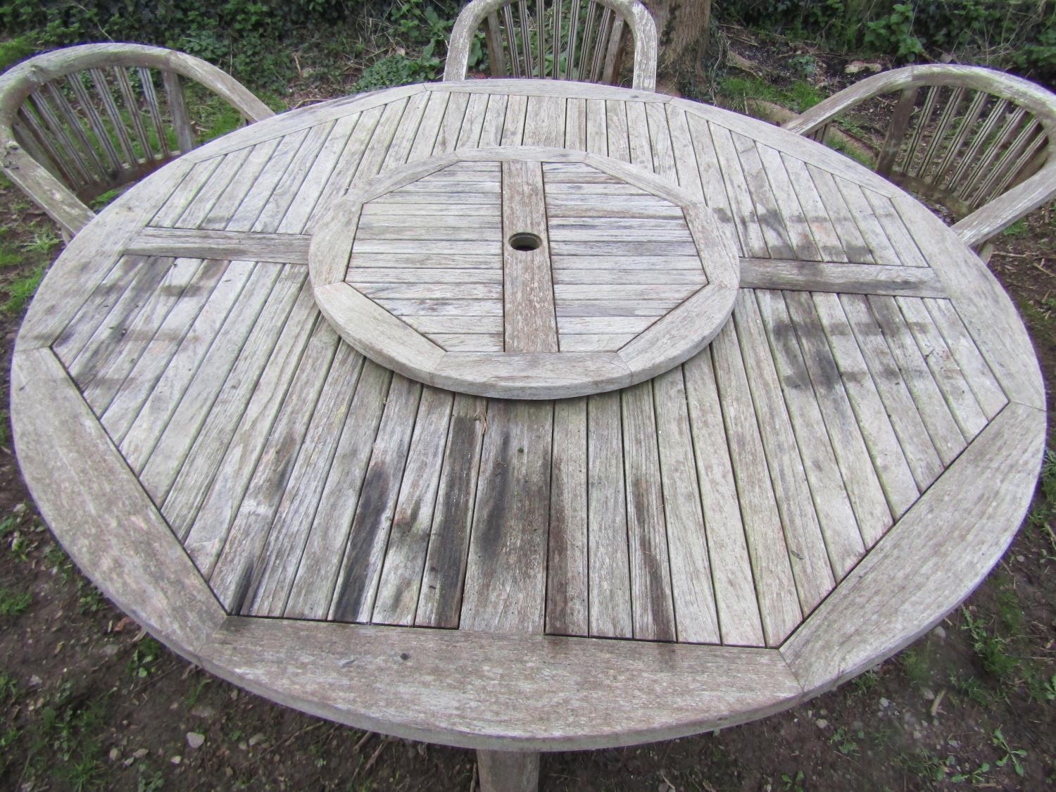 A good quality large weathered (silvered teak) circular garden table with slatted panelled top and - Image 6 of 6