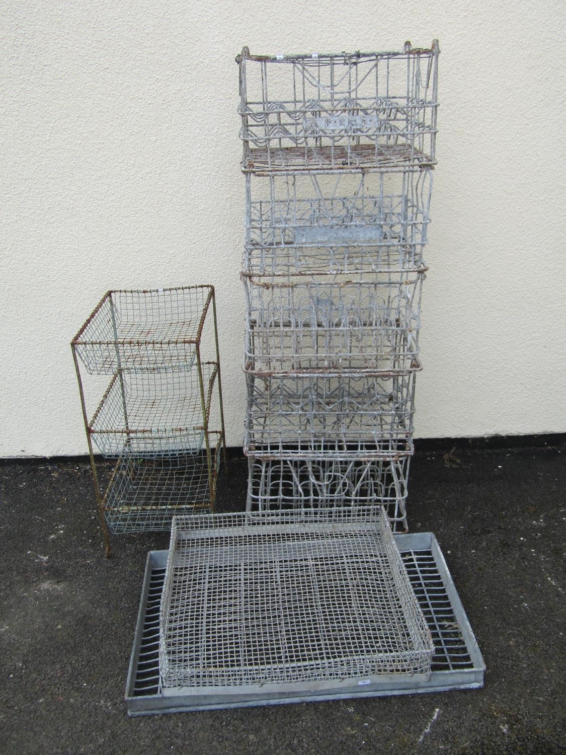 A stack of five vintage galvanised steel bottle crates 26 cm high x 46 cm x 35 cm together with