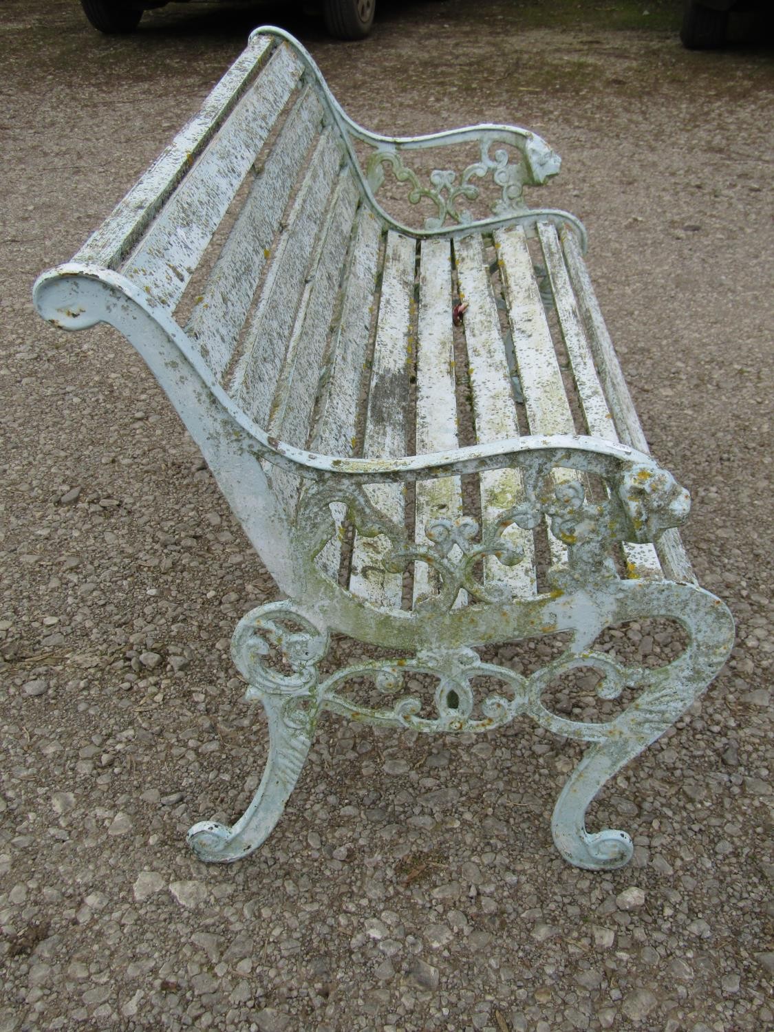 A weathered light blue/cream painted garden bench with slatted seat raised on decorative pierced and - Image 2 of 6