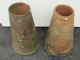Two old weathered terracotta conical shaped rhubarb forcers with moulded collars, one with