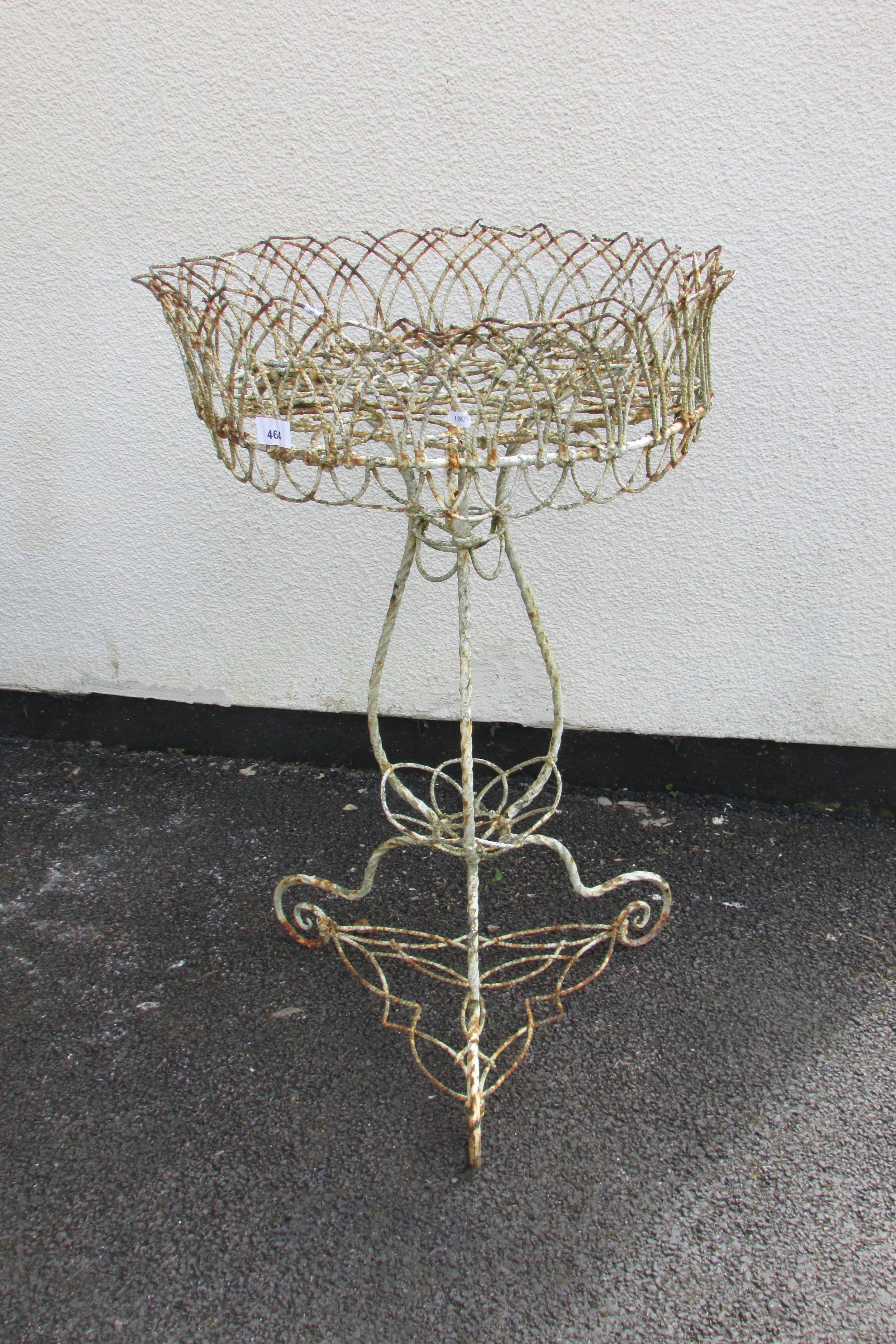 A weathered wire work jardinière with lattice detail and scrolled supports, 53 cm diameter x 82 cm - Image 2 of 3