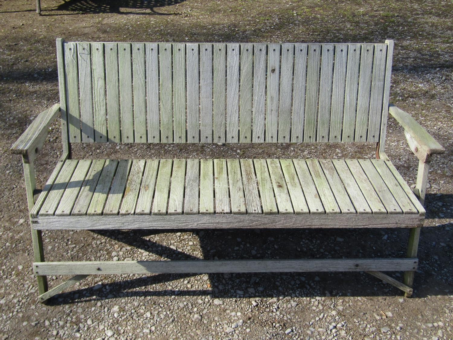A weathered (silvered) teak garden suite comprising a folding bench with slatted seat and back 141 - Image 5 of 6