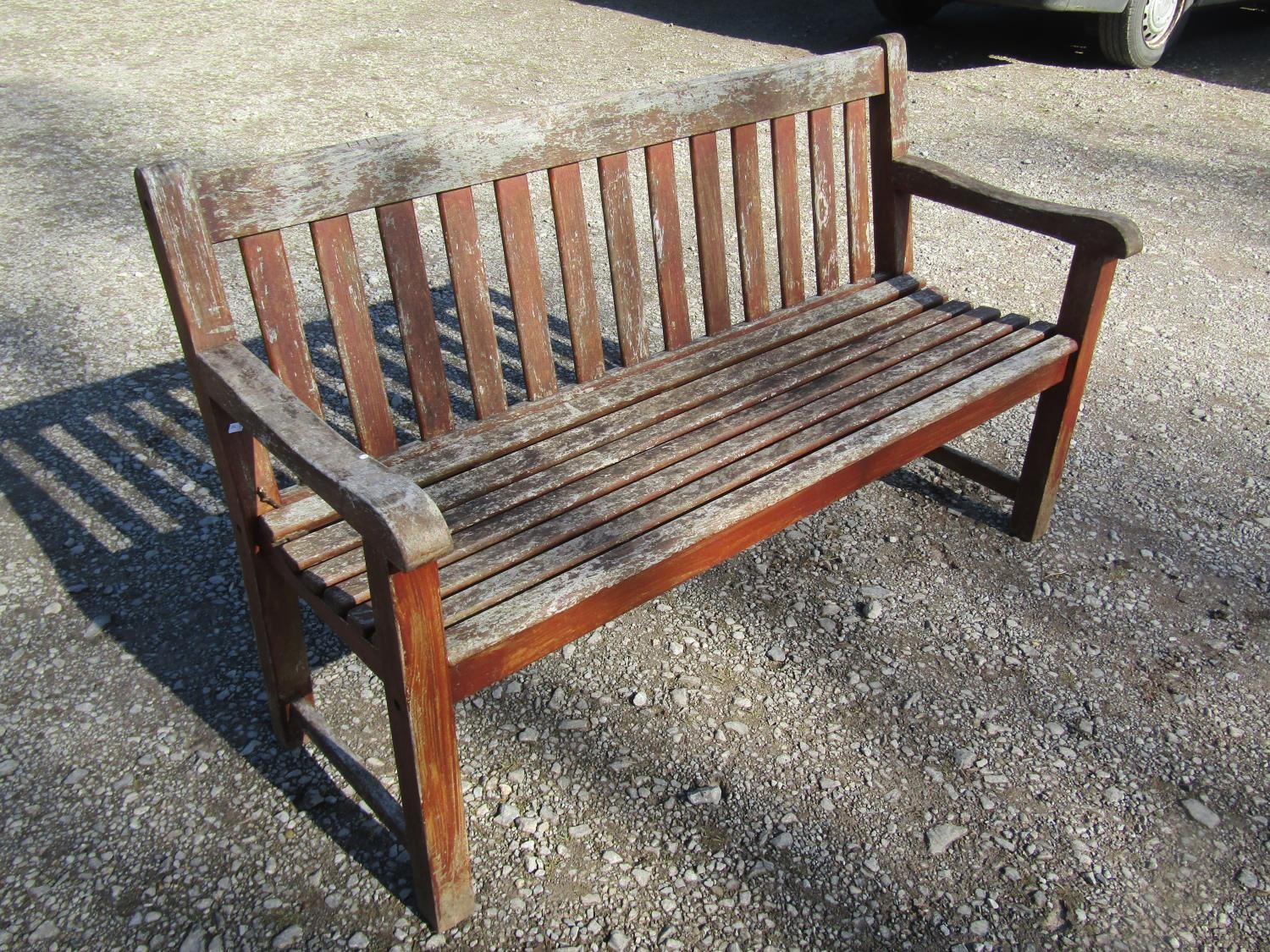 A pair of good quality heavy gauge weathered teak three seat garden benches with slatted seats and - Image 3 of 7