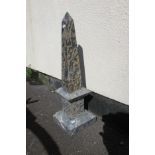 An antique Grand Tour type cut and polished marble obelisk on plinth base, 70cm high, the base