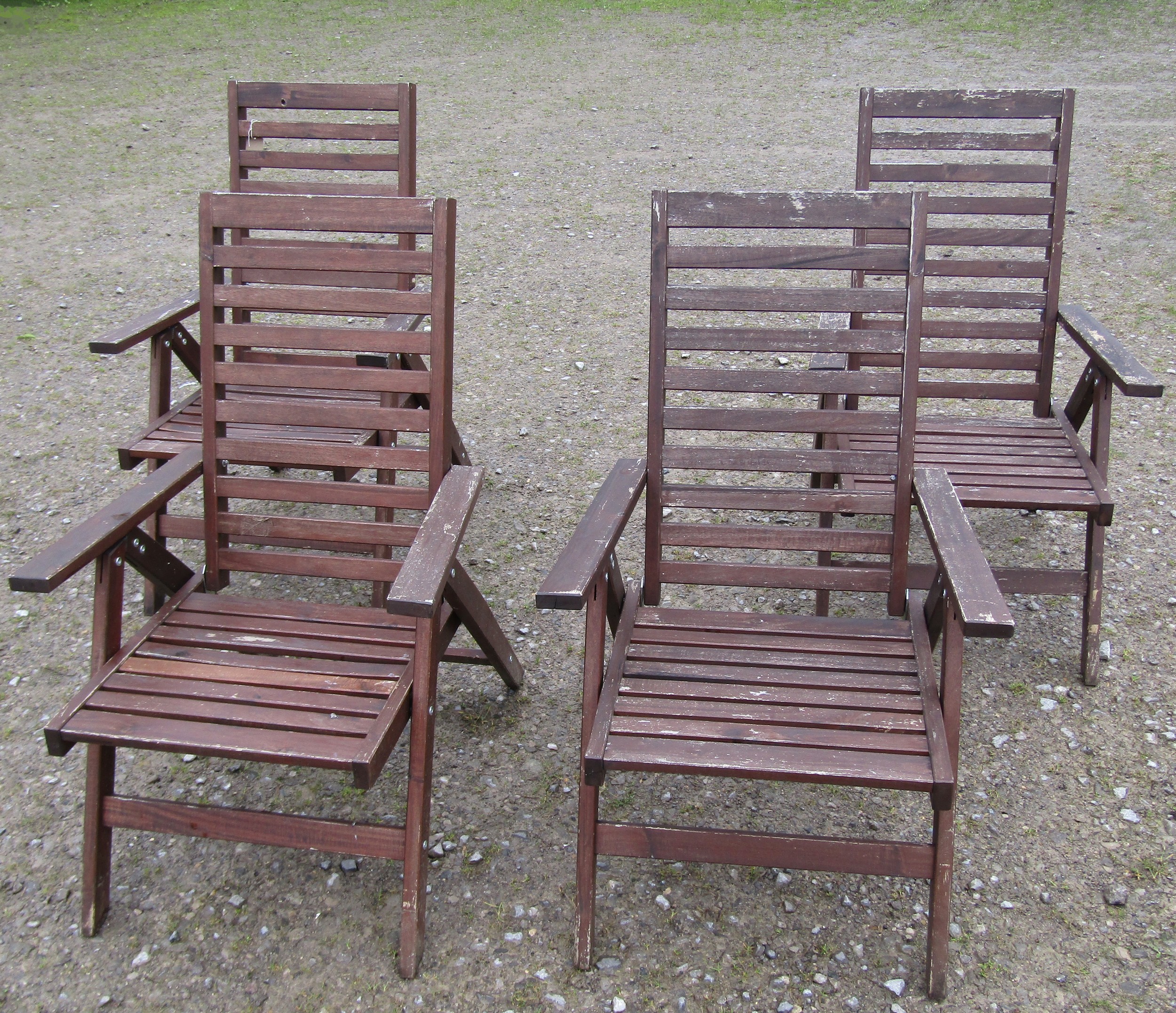 A set of four stained and weathered contemporary folding hardwood garden armchairs with slatted - Image 2 of 4